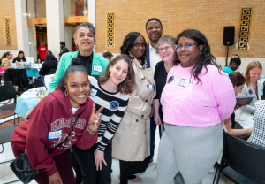 group of HCA staff and tenants in the Greal Hall at the Massachusetts State House